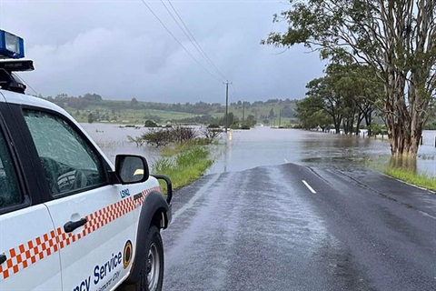 SES truck parked infront of flooded road.jpg