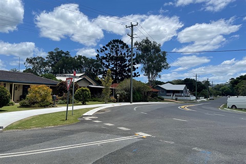 street with sign saying Station Street and Fern Street 