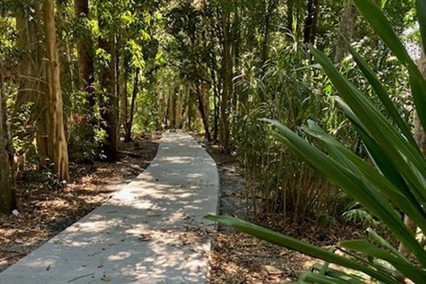 Heritage Park accessible pathway through the arboretum.jpg