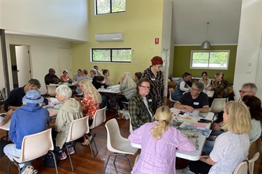 Community members discussing ideas at the Place Planning meeting