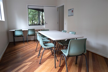 Meeting room with table and chairs