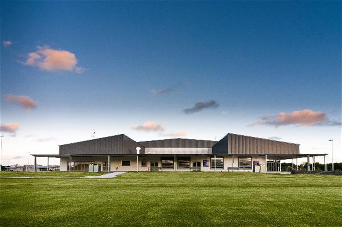 Cavanbah Centre outdoors looking across the sports fields to the centre